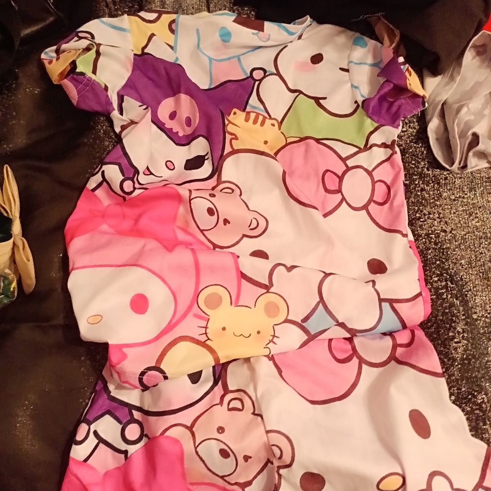 BUNDLE  2  SETS HELLO KITTY CLOTHES SIZE 10/12. NEW.